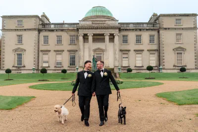 Grooms walking with their dogs on their wedding day in Dublin